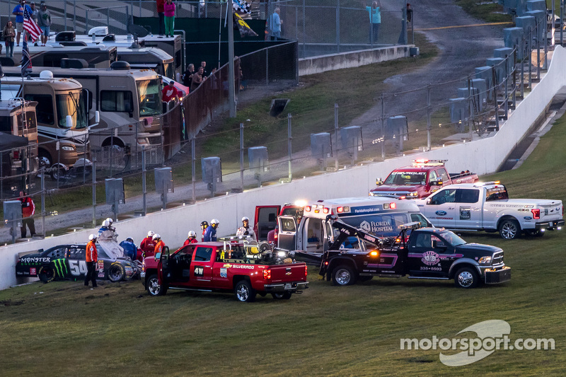 Kyle Busch, Joe Gibbs Racing Toyota is treated by track medical