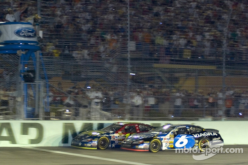 Greg Biffle takes the checkered flag inches ahead of Mark Martin