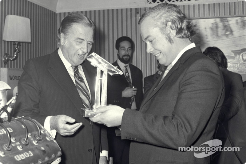 50th Grand Prix win: Henri Ford II presents Keith Duckworth with trophy for his 50 Grand Prix wins