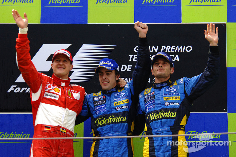 Podium: race winner Fernando Alonso with Michael Schumacher and Giancarlo Fisichella