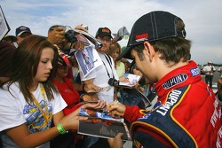 Jeff Gordon signs autographs for his fans