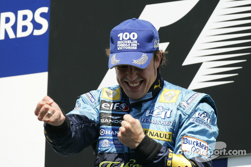 Podium: race winner Fernando Alonso celebrates