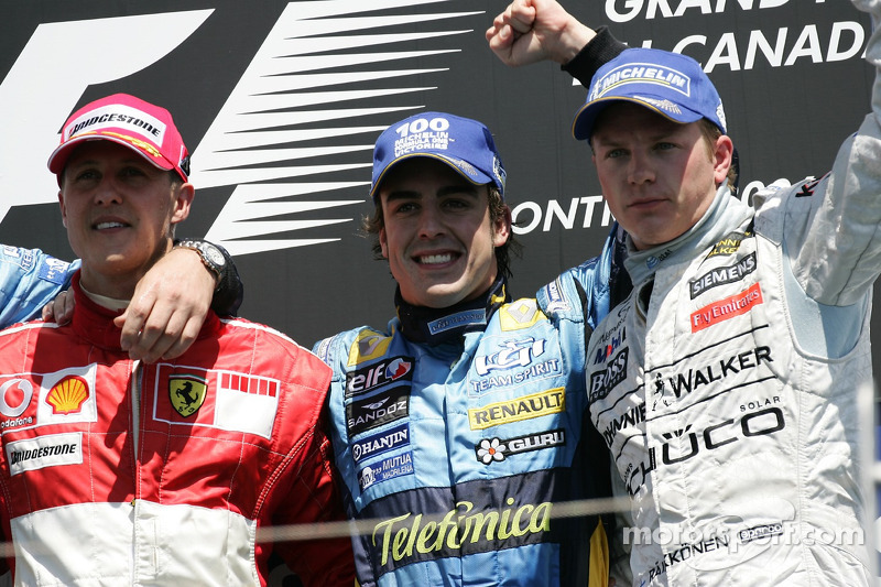 Podium: winnaar Fernando Alonso met Michael Schumacher en Kimi Raikkonen