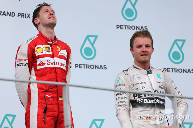 Sebastian Vettel, Scuderia Ferrari, und Nico Rosberg, Mercedes AMG F1 Team