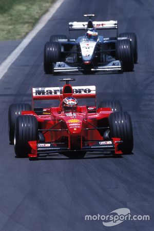 Michael Schumacher, Ferrari, und Mika Häkkinen, McLaren