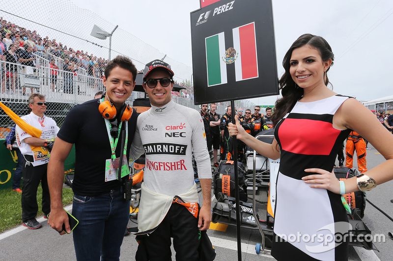 Javier Hernandez, jogador do Manchester Utd com Sergio Perez, Sahara Force India F1 no grid grid