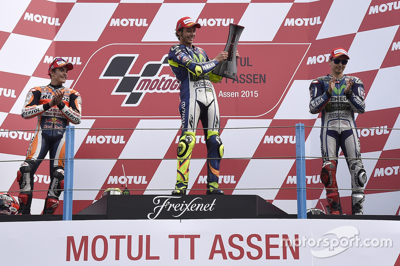 Podium: race winner Valentino Rossi, second place Marc Marquez, third place Jorge Lorenzo