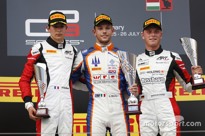 Luca Ghiotto, Trident celebrates his win on the podium with second place Esteban Ocon, ART Grand Pri