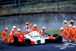 The infamous crash of Ayrton Senna and Alain Prost on lap 46