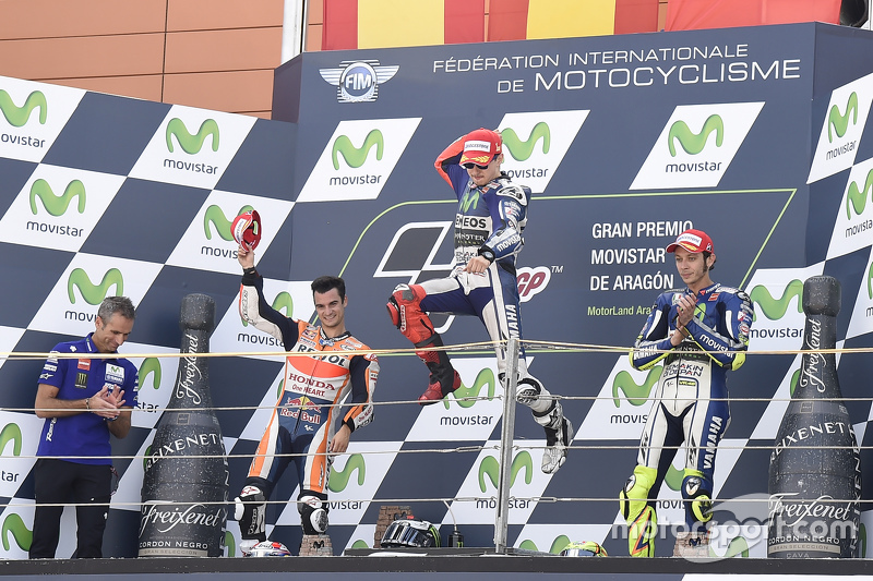 Podium: second place Dani Pedrosa, Repsol Honda Team and winner Jorge Lorenzo and third place Valent