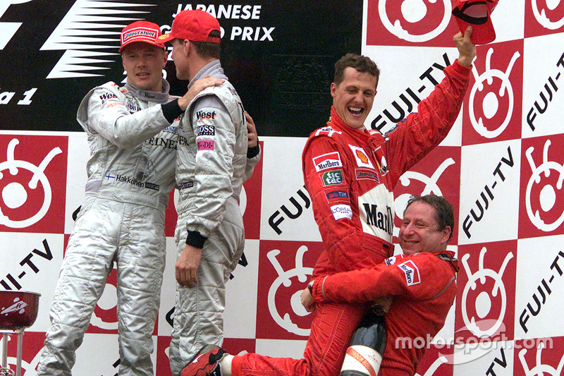 Podium: race winner and 2000 World Champion Michael Schumacher, Ferrari, second place Mika Hakkinen,