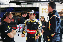 (L to R): Mark Slade, Lotus F1 Team Race Engineer with Pastor Maldonado, Lotus F1 Team and Federico Gastaldi, Lotus F1 Team Deputy Team Principal