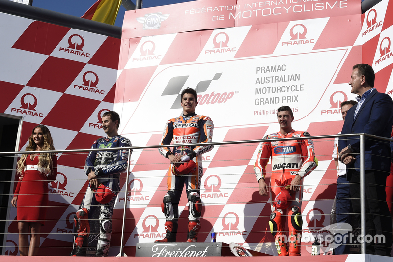 Podium: second place Jorge Lorenzo, Yamaha Factory Racing, race winner Marc Marquez, Repsol Honda Te