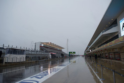 A wet and rainy pit lane