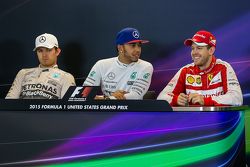 The post race FIA Press Conference; Second place Nico Rosberg, Mercedes AMG F1, race winner and World Champion Lewis Hamilton, Mercedes AMG F1, and third place Sebastian Vettel, Ferrari