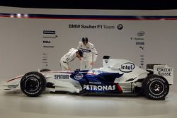 Robert Kubica and Nick Heidfeld pose with the new BMW Sauber F1.08