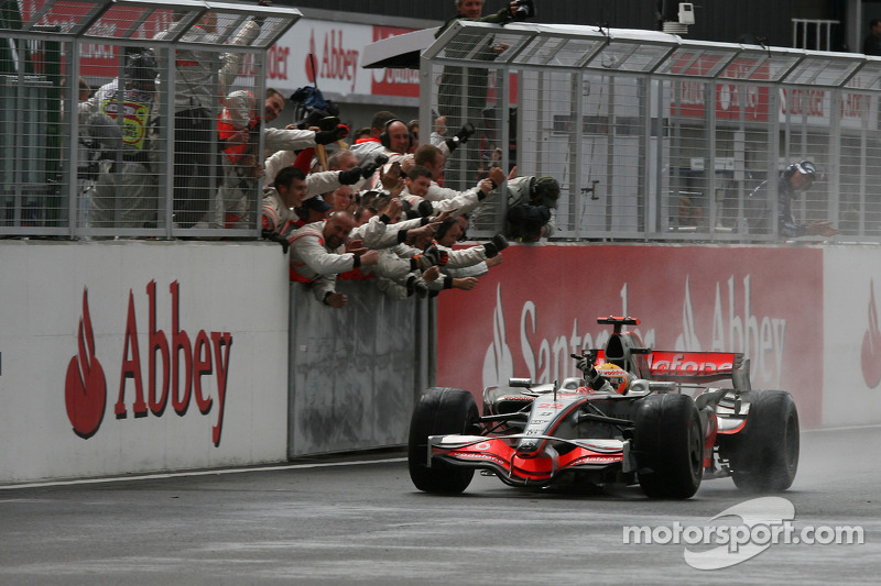 Race winner Lewis Hamilton celebrates