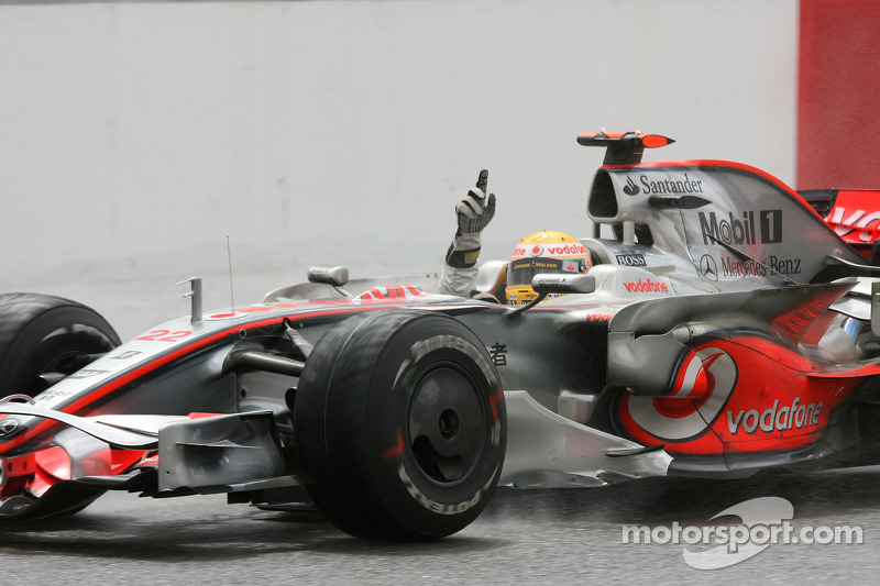 Race winner Lewis Hamilton celebrates