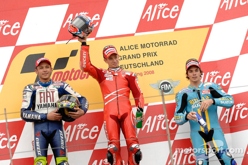 Podium: race winner Casey Stoner, second place Valentino Rossi, third place Chris Vermeulen