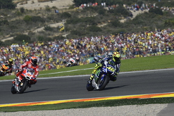 Valentino Rossi, Yamaha Factory Racing and Michele Pirro, Ducati Team