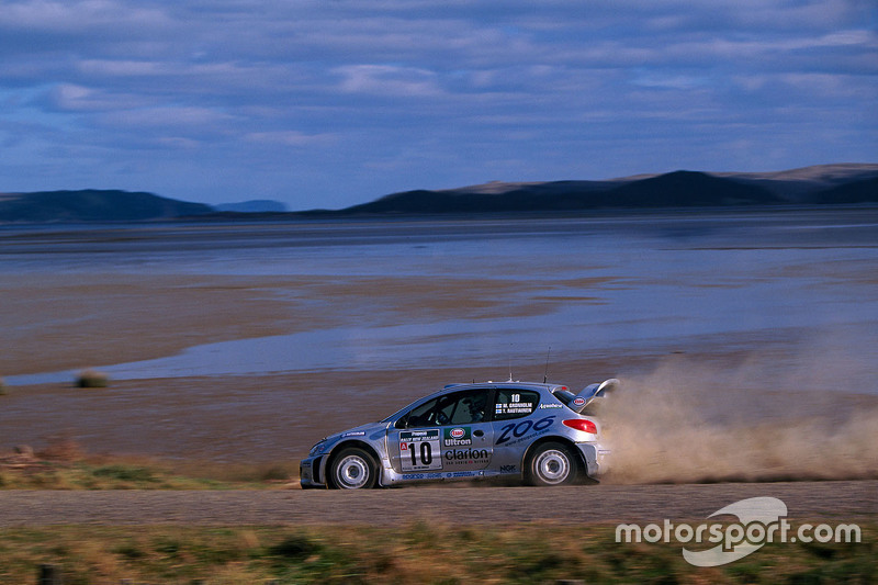 Marcus Gronholm, dan Timo Rautiainen, Peugeot Sport Peugeot 206 WRC