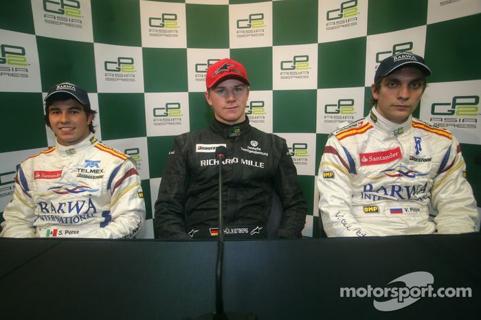 Nico Hulkenberg celebra su pole con Sergio Perez y Vitaly Petrov