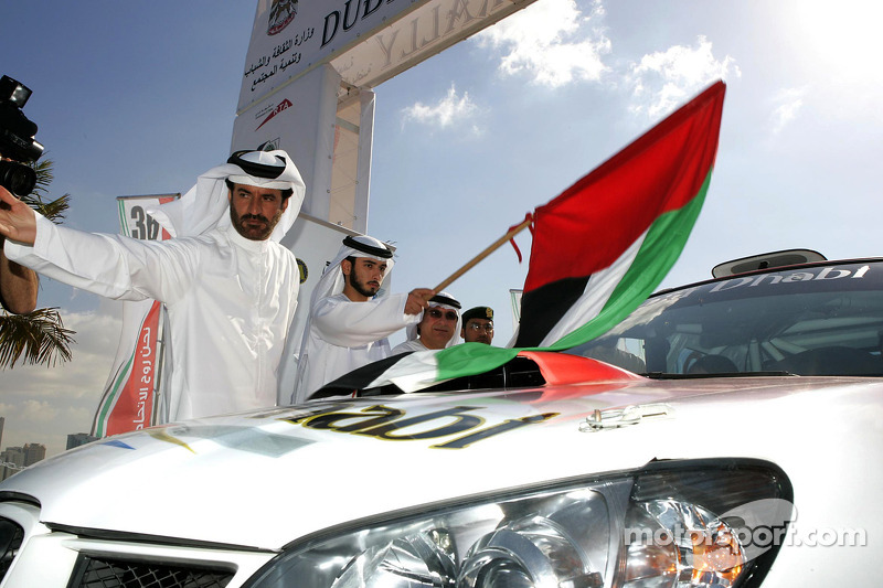 FIA’s Vice-President for sport and 14-time Middle East Rally Champion Mohamed Ben Sulayem gives the start flag for Dubai International Rally
